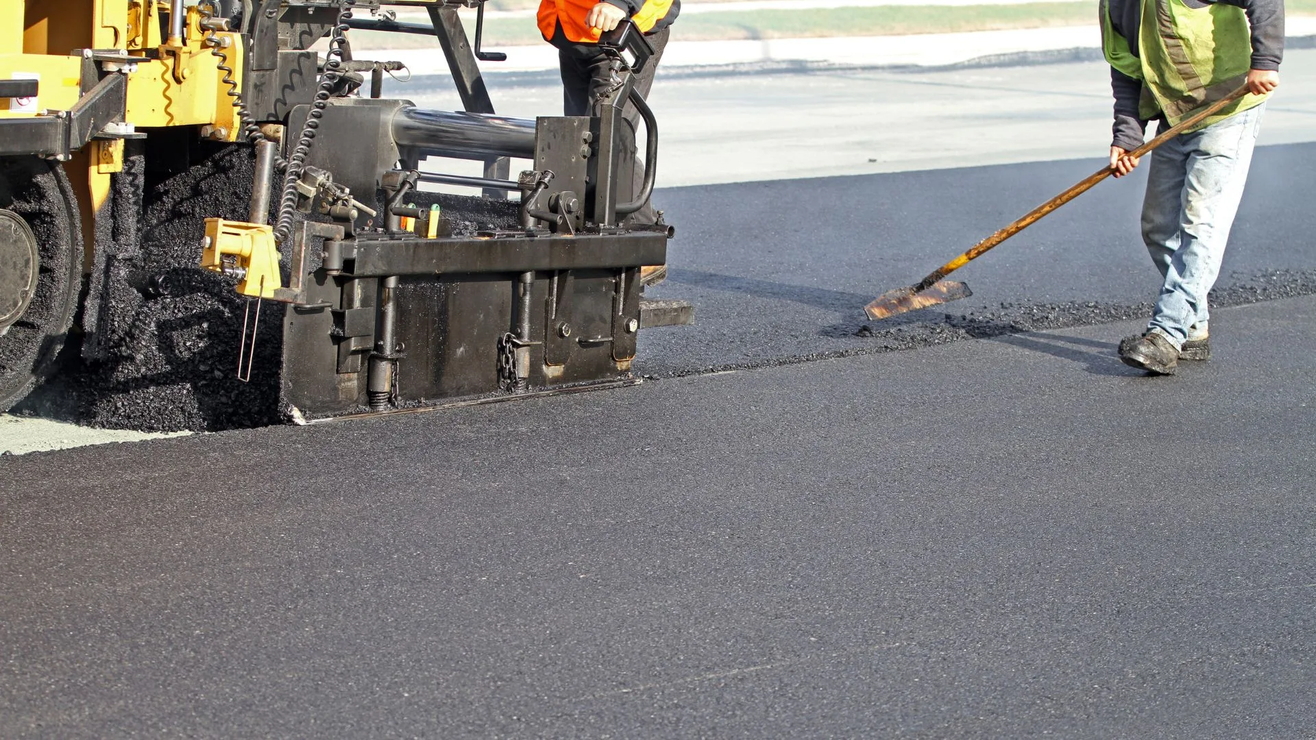 Paving crew laying hot mix asphalt made with 120/150 penetration grade bitumen